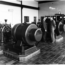Two men inside Whitehall pumping station. On the left is James Boyd,Water Engineer to Stevenage Development Corporation (SDC), later a councillor on Stevenage Borough Council. On the right is SDC Water Engineer Philip Brown.; Stevenage, Hertfordshire, Whitehall Pumping Station; 1956;Pumping Station; 1956; | Stevenage Museum